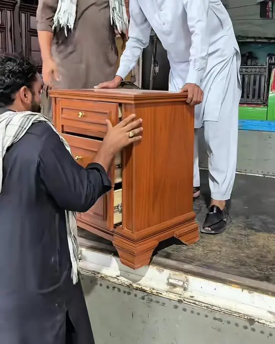 Furniture being loaded for delivery to Faisal Town