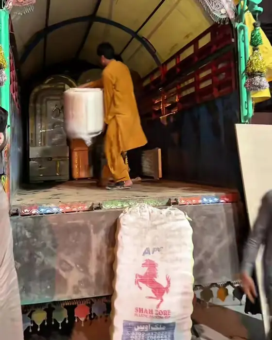 Furniture being loaded for delivery to Mansehra