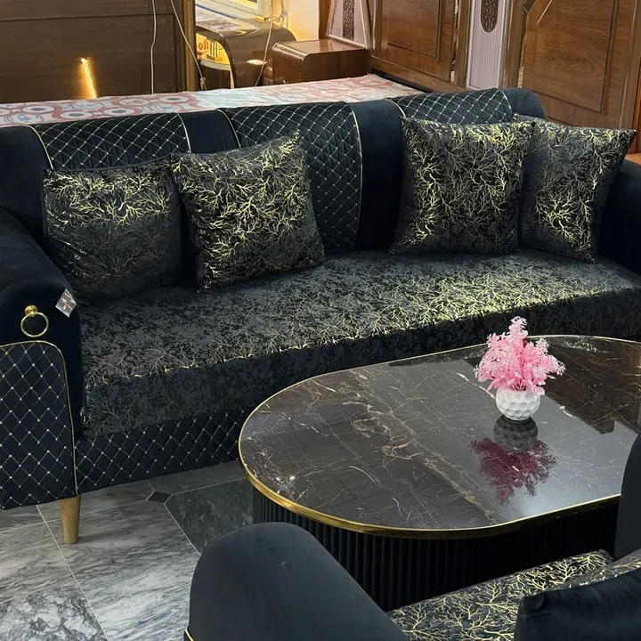 Black quilted sofa at Arshad Furniture House